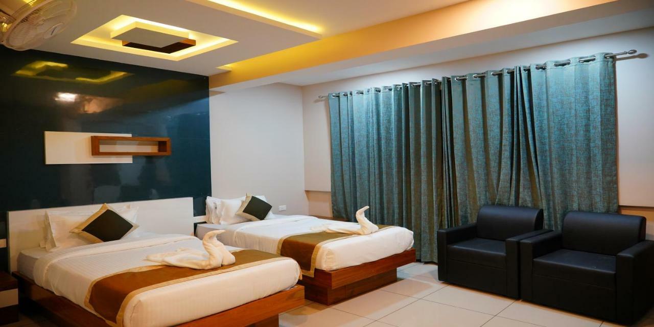 Nextel Inn, Calicut Extérieur photo