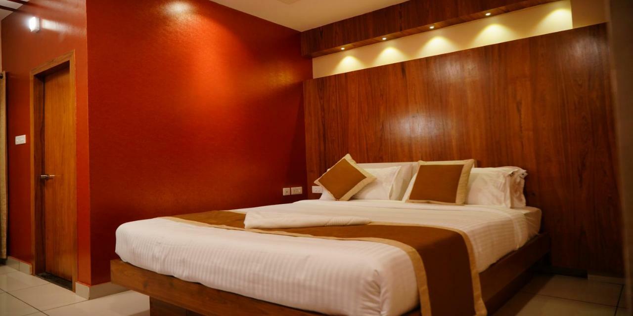 Nextel Inn, Calicut Extérieur photo