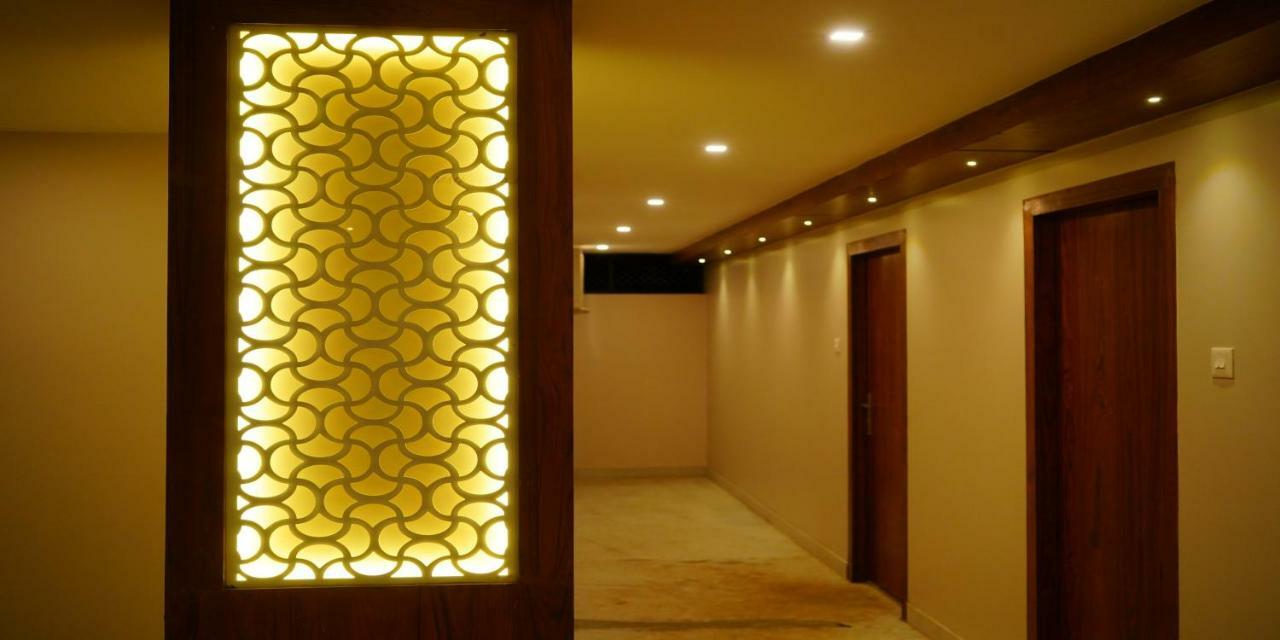 Nextel Inn, Calicut Extérieur photo