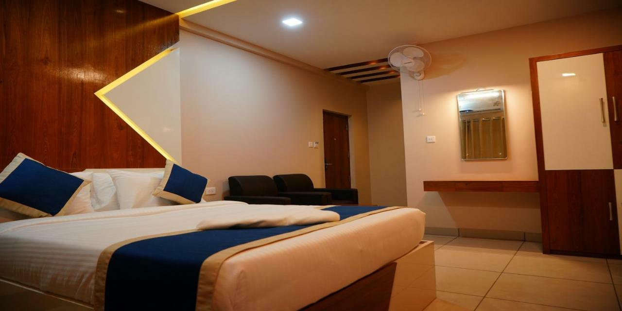 Nextel Inn, Calicut Extérieur photo