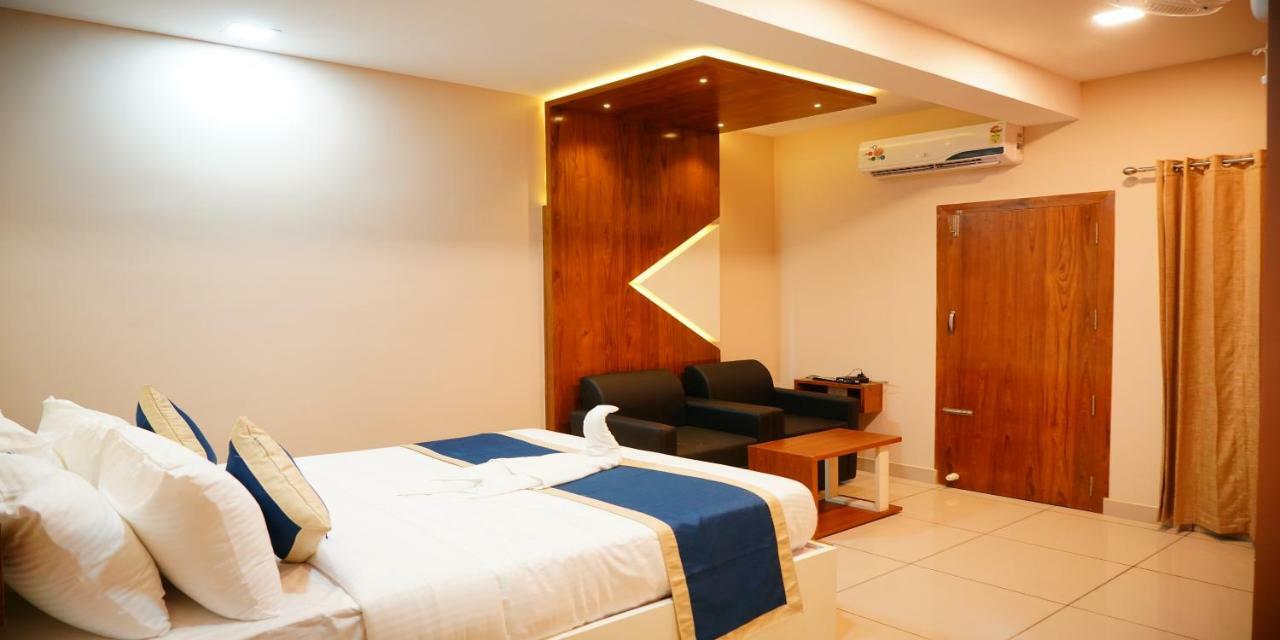 Nextel Inn, Calicut Extérieur photo