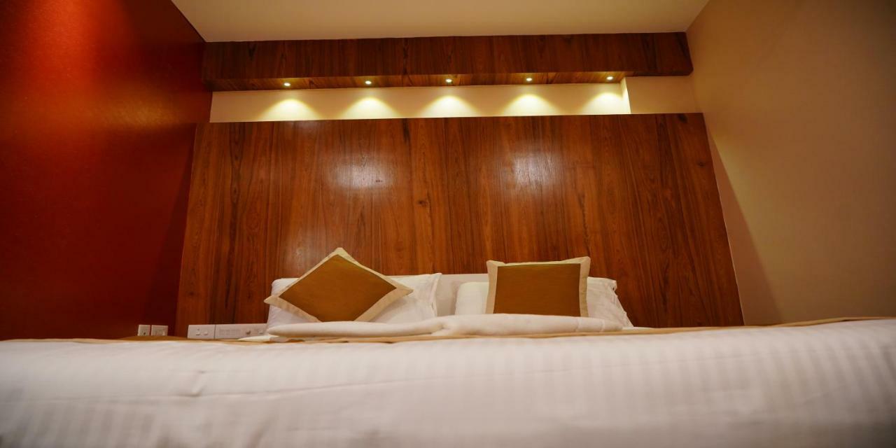 Nextel Inn, Calicut Extérieur photo