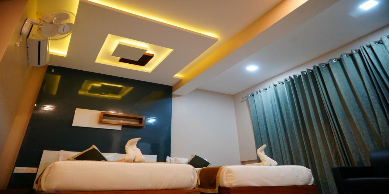 Nextel Inn, Calicut Extérieur photo