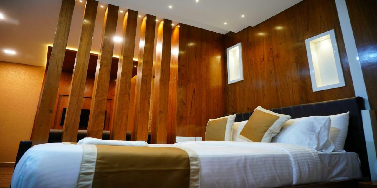 Nextel Inn, Calicut Extérieur photo