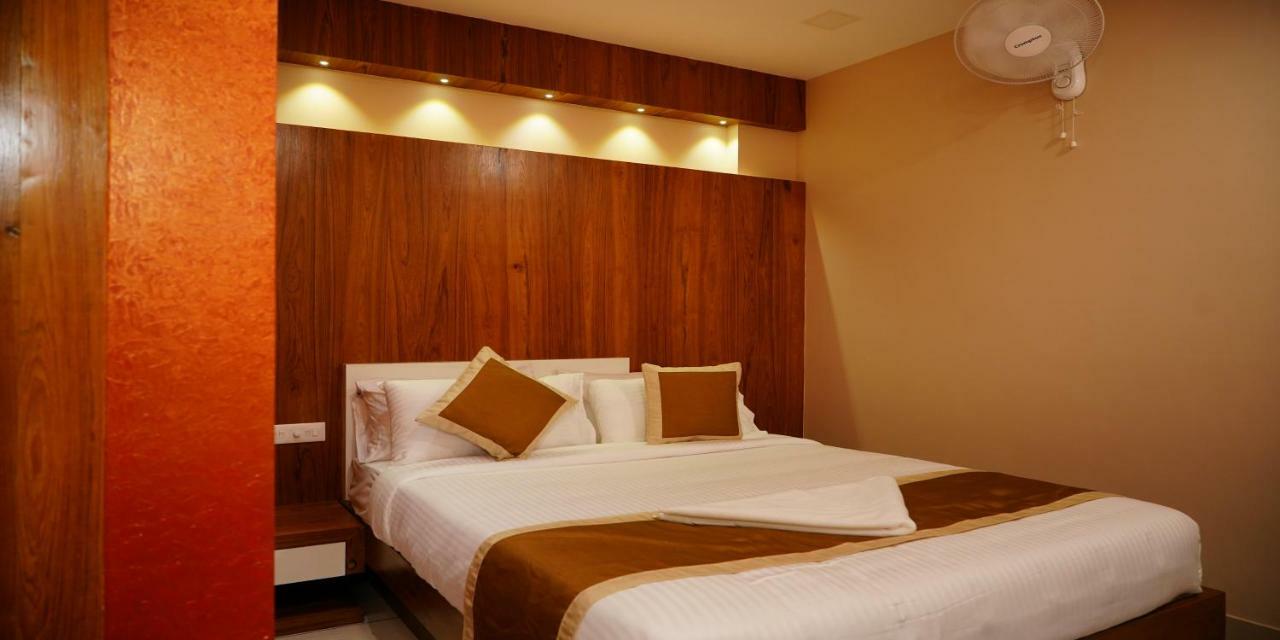 Nextel Inn, Calicut Extérieur photo