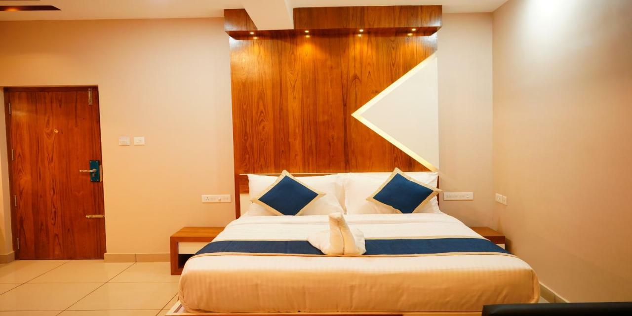 Nextel Inn, Calicut Extérieur photo