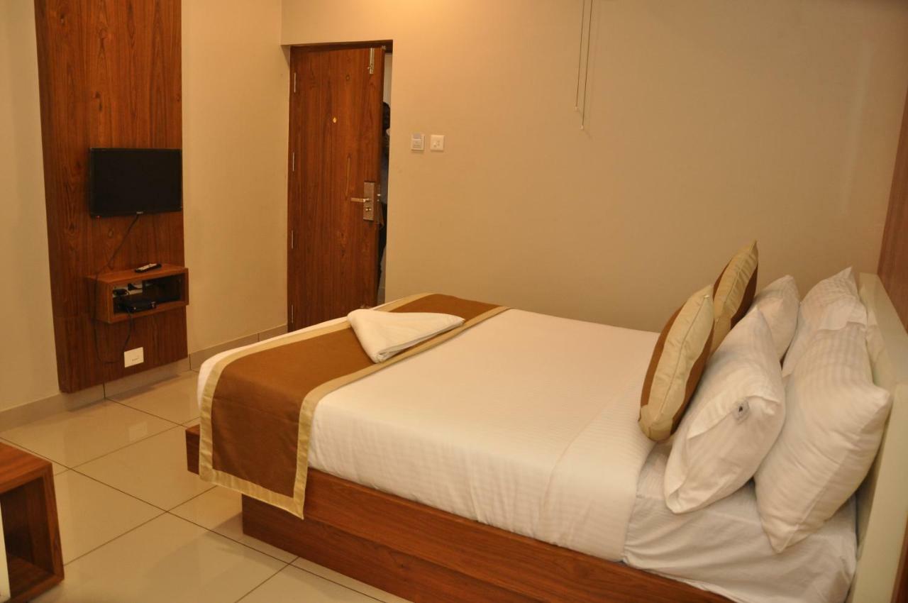 Nextel Inn, Calicut Extérieur photo