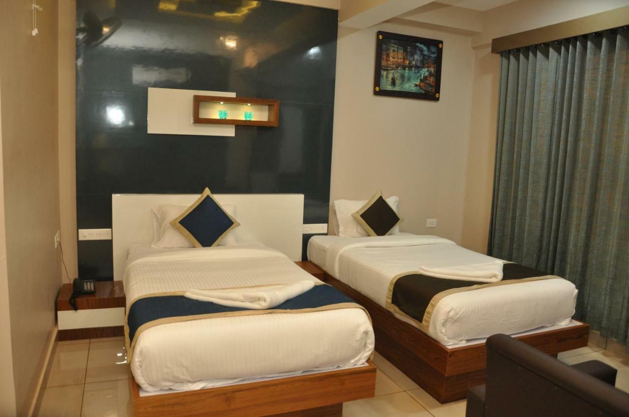 Nextel Inn, Calicut Extérieur photo