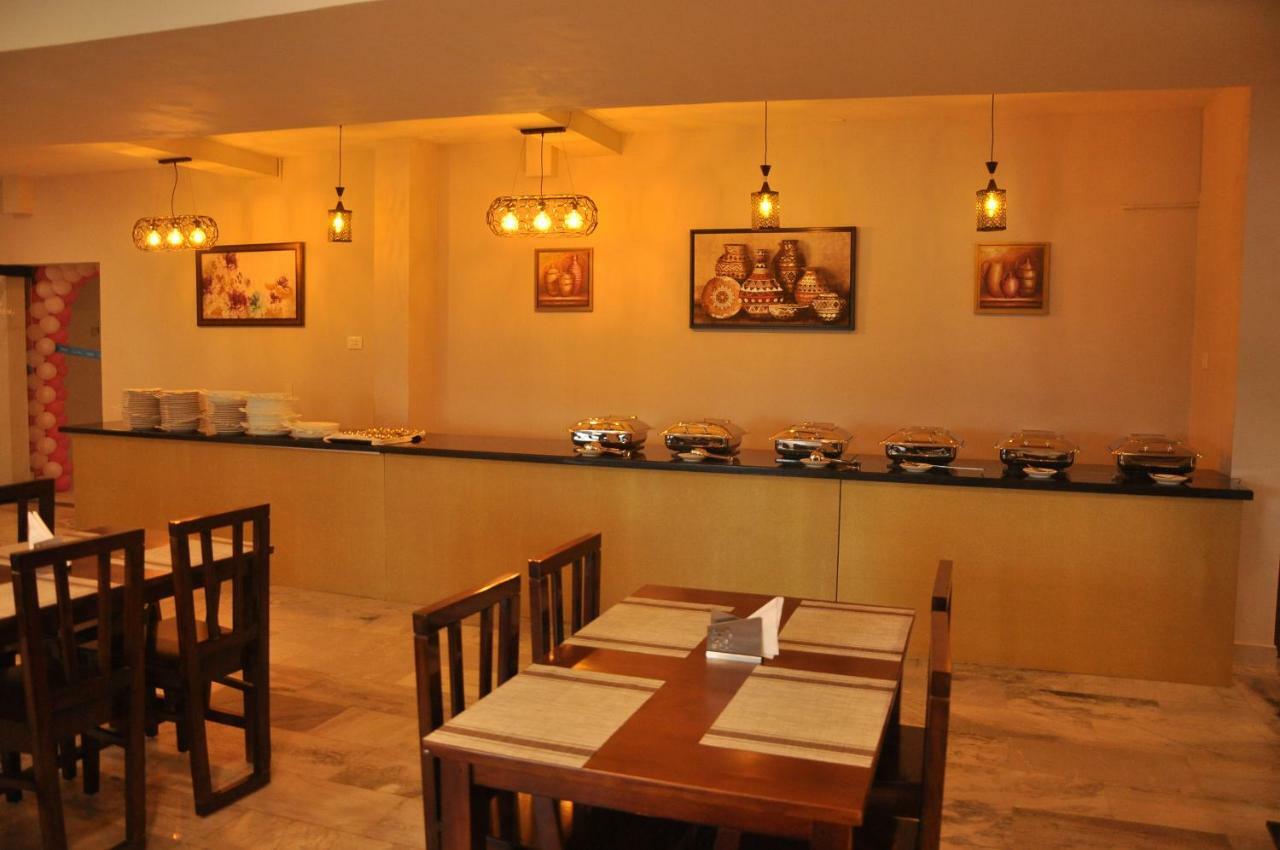 Nextel Inn, Calicut Extérieur photo