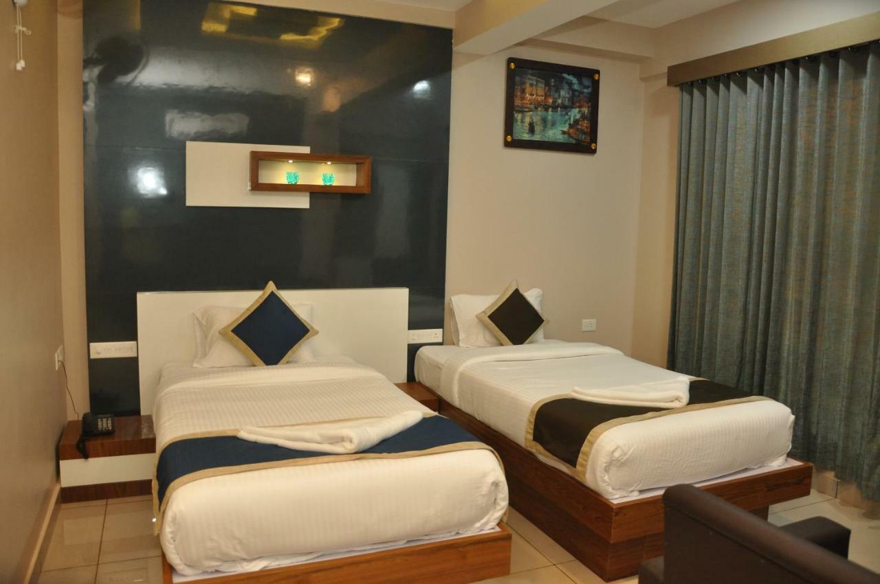 Nextel Inn, Calicut Extérieur photo