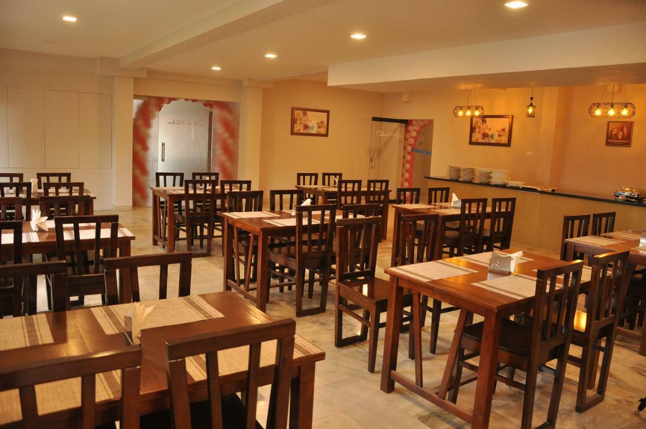 Nextel Inn, Calicut Extérieur photo