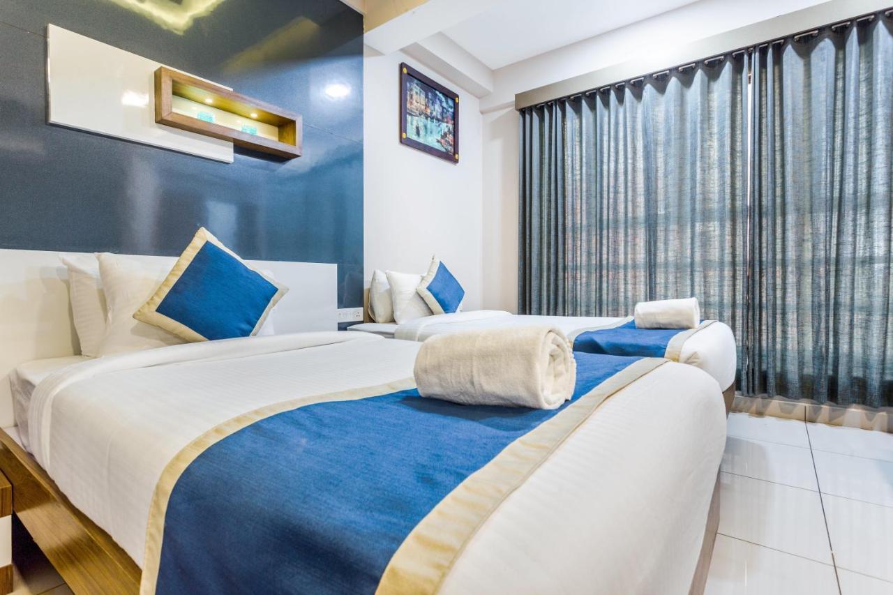 Nextel Inn, Calicut Extérieur photo
