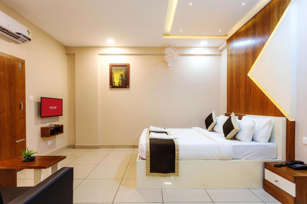 Nextel Inn, Calicut Extérieur photo