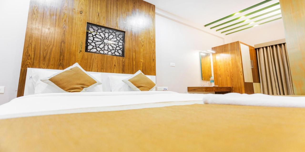 Nextel Inn, Calicut Extérieur photo